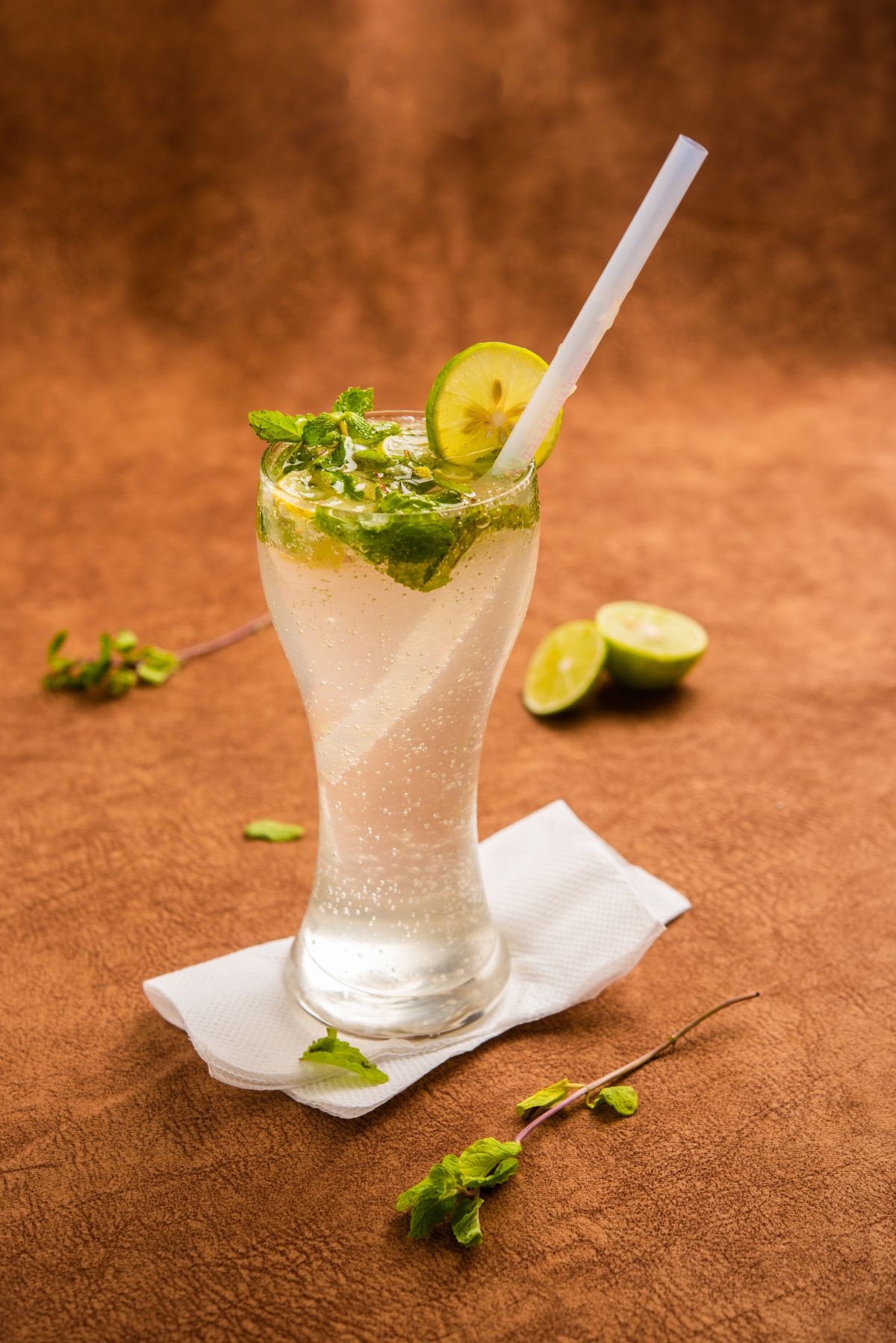 Sparkling mojito with ice, lime, and fresh mint